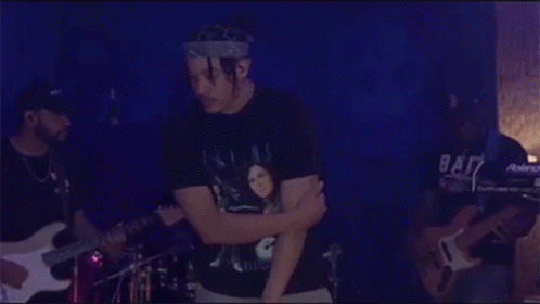 Man Wearing Bandana With Guitarist And Drummer GIF