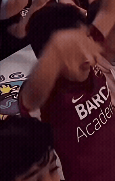 Man Wearing Barc Academy Shirt