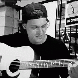 Man Wearing Baseball Cap Playing Guitar GIF
