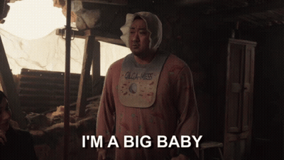 Man Wearing Bib Saying Olga Mess GIF