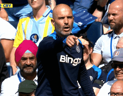 Man Wearing Bingx Shirt Pointing GIF