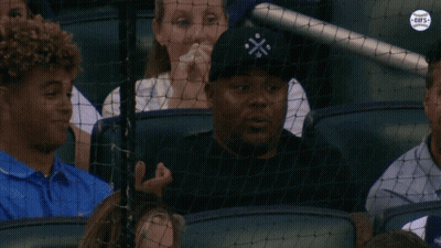 Man Wearing Black Cross Hat GIF