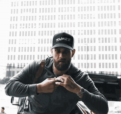 Man Wearing Black Hat Saying Three GIF