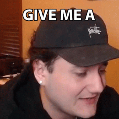 Man Wearing Black Hat With Give Me A GIF