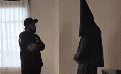 Man Wearing Black Hat With L GIF
