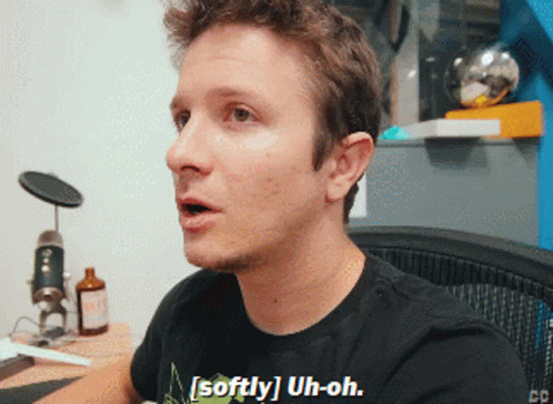 Man Wearing Black Shirt That Says Softly Uh-Oh GIF
