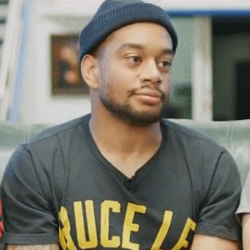 Man Wearing Black T-Shirt Saying Bruce La GIF