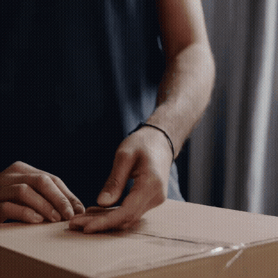 Man Wearing Black Wristband Packing Box GIF