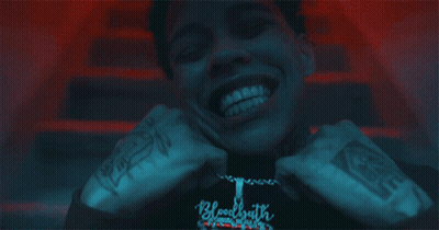 Man Wearing Bloodbath Necklace GIF