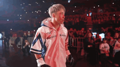 Man Wearing Boxing Gloves And Docomo Jacket GIF