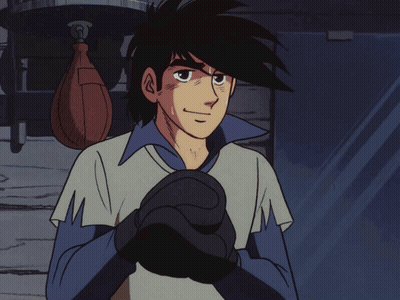 Man Wearing Boxing Gloves In Store GIF