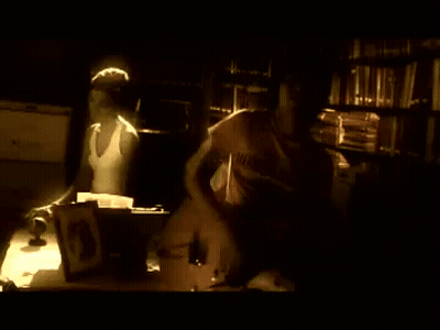 Man Wearing Boys Shirt Sitting At Desk GIF