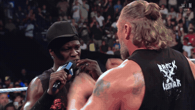 Man Wearing Brick Lestar Tank Top GIF