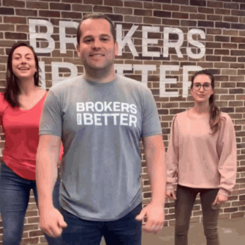 Man Wearing Brokers Better Shirt In Front Of Two Women GIF