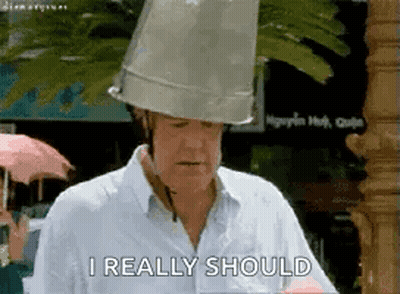 Man Wearing Bucket On Head Saying I Really Should GIF