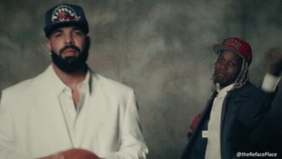 Man Wearing Bulls Hat Beside Another Man GIF
