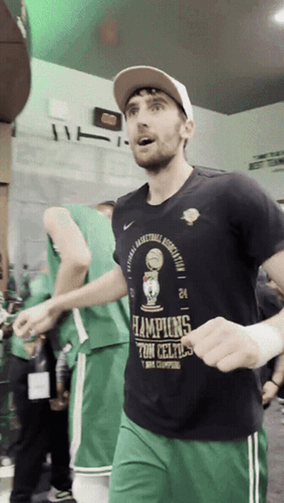 Man Wearing Champions Shirt GIF