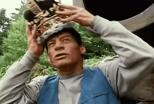 Man Wearing Crown Looking Up GIF
