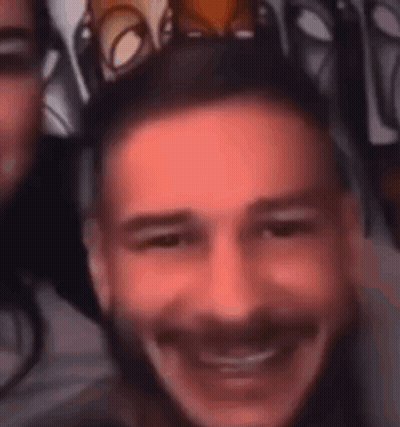 Man Wearing Crown Smiling Close Up GIF
