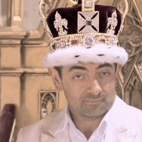 Man Wearing Crown With Diamonds And Emeralds GIF