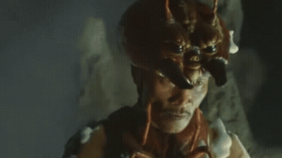 Man Wearing Devil Hat In Darkness GIF