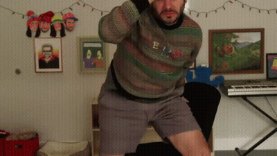 Man Wearing E Sweater GIF