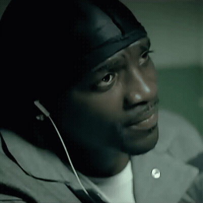 Man Wearing Ear Buds And Headband GIF
