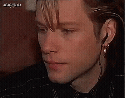 Man Wearing Earbuds And Plaid Shirt GIF
