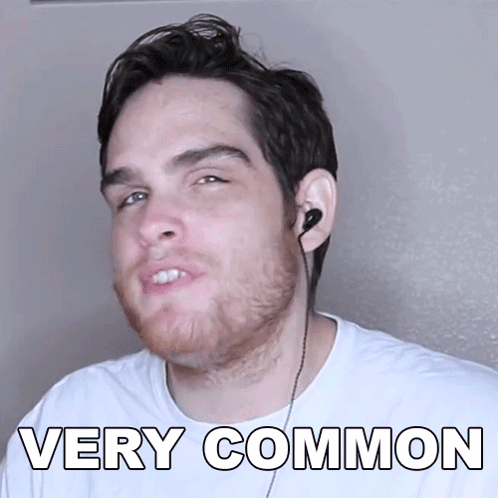 Man Wearing Earbuds And White Shirt Saying Very Common GIF