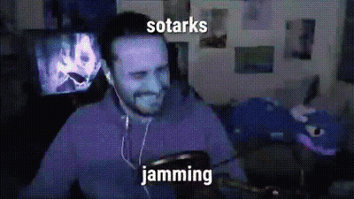 Man Wearing Earbuds Listening To Sotarks Jamming GIF