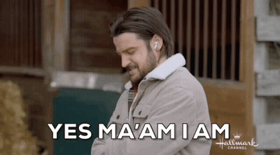 Man Wearing Earbuds Saying Yes Ma'am GIF