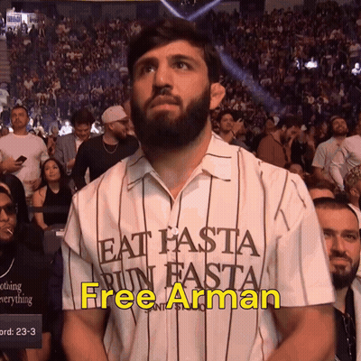 Man Wearing Eat Hasta Run Hasta Shirt GIF