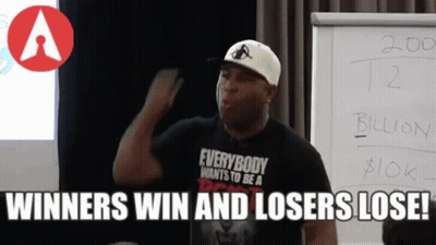 Man Wearing Everybody Wants To Be A Winner Shirt GIF