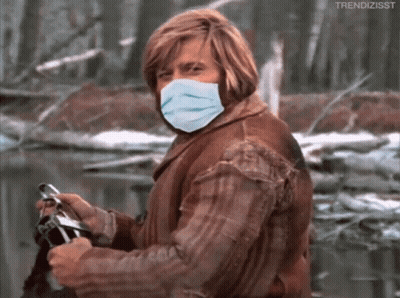 Man Wearing Face Mask Holding Camera GIF