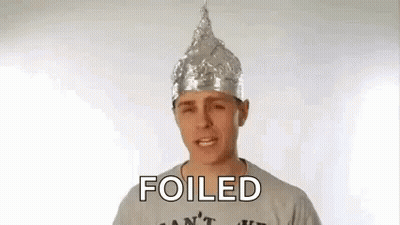 Man Wearing Foil Hat With Foiled Text GIF