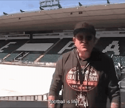 Man Wearing Football Is Life Shirt GIF