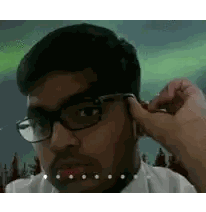 Man Wearing Glasses Adjusting Ear Plugs Sticker
