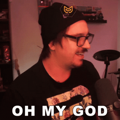 Man Wearing Glasses And Beanie Saying Oh My God GIF