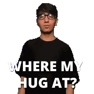 Man Wearing Glasses And Black Shirt Saying Where My Hug At Sticker
