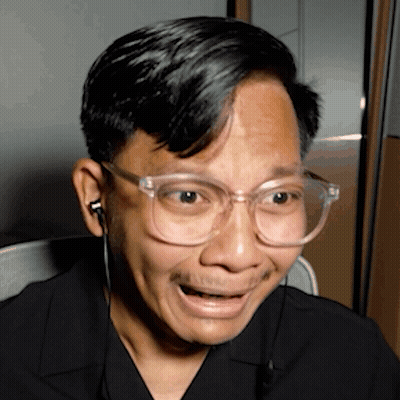 Man Wearing Glasses And Earbuds GIF