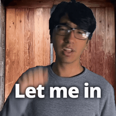 Man Wearing Glasses and Grey Shirt Says Let Me In