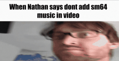 Man Wearing Glasses And Hat Making Funny Face GIF