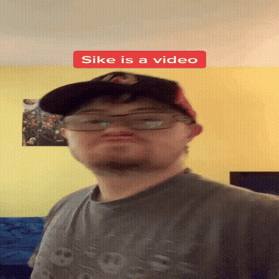 Man Wearing Glasses And Hat Saying Sike Is A Video GIF