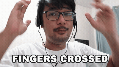 Man Wearing Glasses And Headphones Fingers Crossed GIF