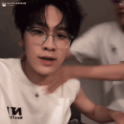 Man Wearing Glasses And Nexttide T-Shirt GIF