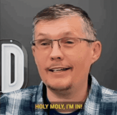 Man Wearing Glasses And Plaid Shirt Saying Holy Moly GIF