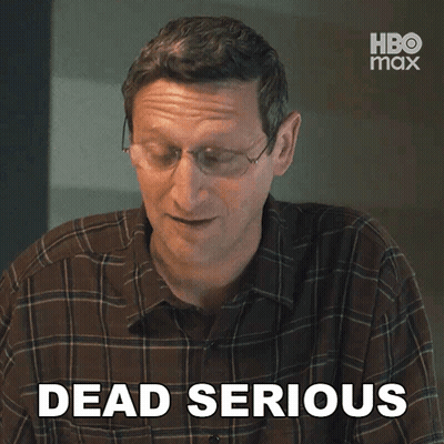 Man Wearing Glasses And Plaid Shirt Smiling GIF