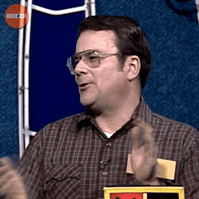 Man Wearing Glasses And Plaid Shirt With Buzzr Logo GIF