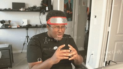 Man Wearing Glasses And Red Headband Looking At Phone GIF