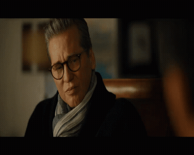Man Wearing Glasses And Scarf Looking GIF